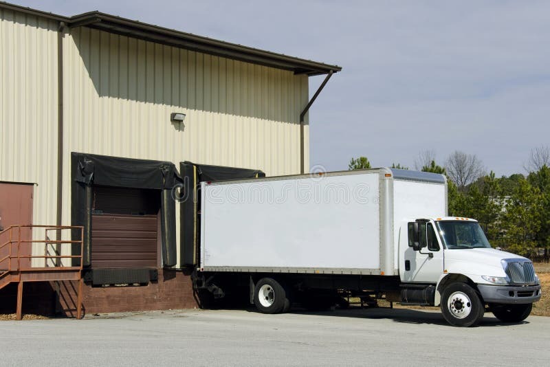 moving truck in-front of a house